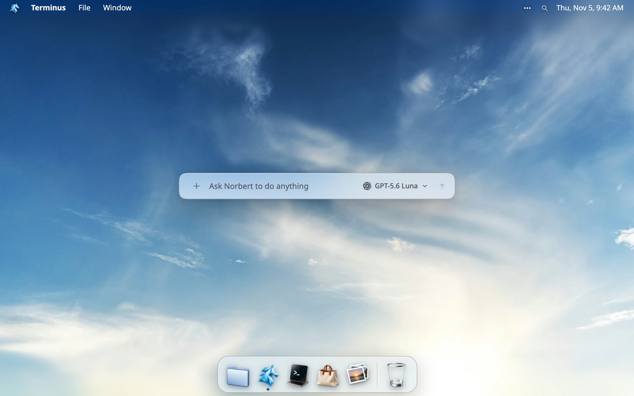 The Terminus desktop: a menu bar, a dock, and the composer that asks Norbert to do anything.